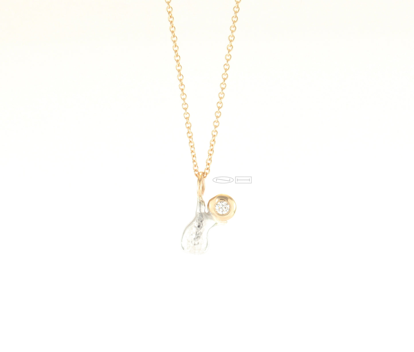 Canadian handmade by ZEALmetal in Kingston ONJoy ~ 14kt yellow gold, sterling silver, with 5pt round brilliant cut diamond. On a 14kt yellow gold 16" cable chain. Joy is a free spirit with a clear view... 