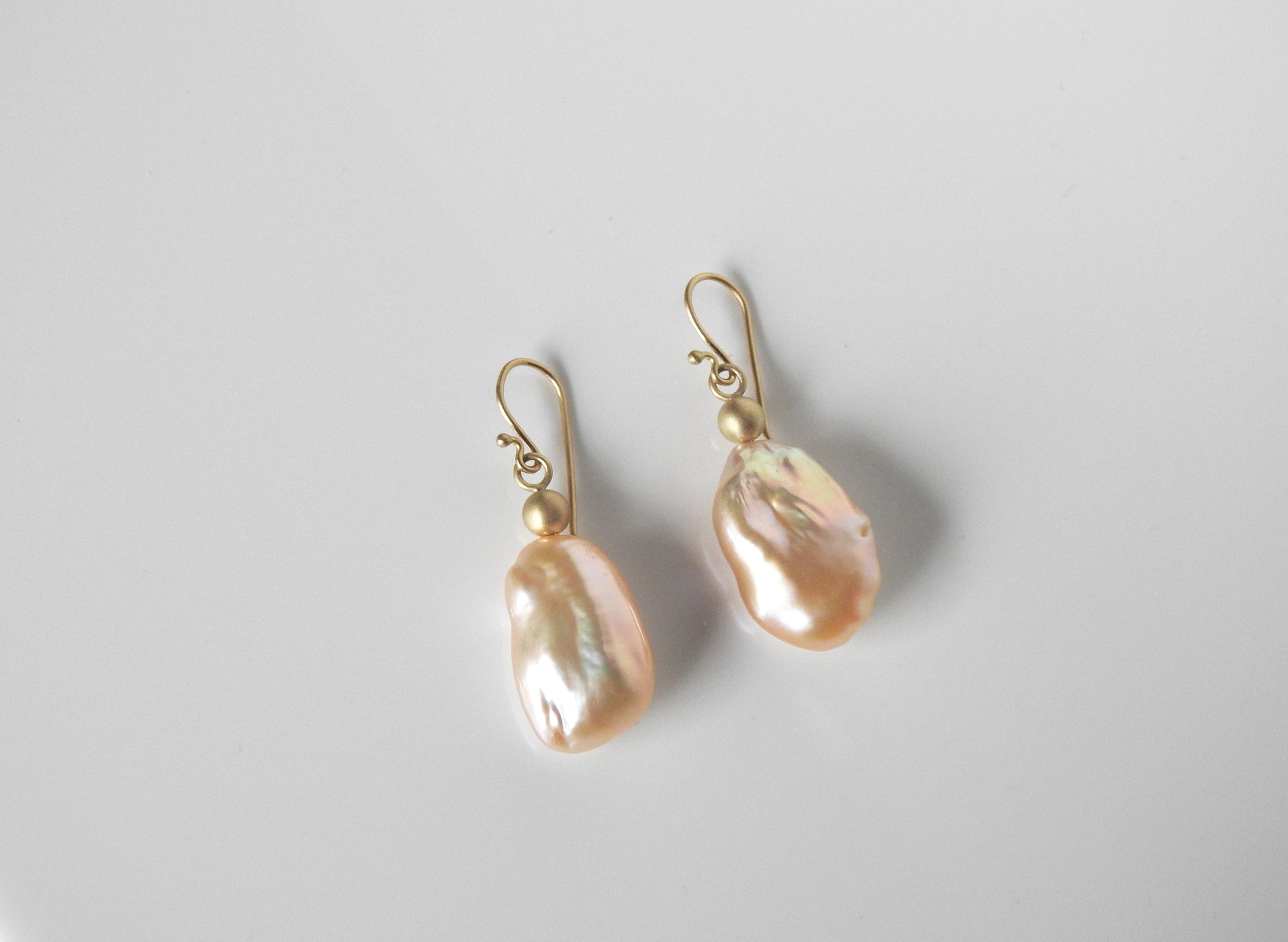 Bold organic and rich with there 18kt accent beads and wires.  Gorgeous peach/pink baroques, so bold yet so light, by ZEALmetal, Nicole Horlor, in Kingston, ON Canada