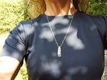 Limestone inlay pendant by ZEALmetal, Nicole Horlor, Kingston, ON, Canada