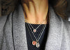 Little wire sculpture pendant with gold drop shape link,  sterling silver centre round link gently holding an un-drilled 8.5 mm rose quartz stone, free floating emphasizing space and freedom., by ZEALmetal, Nicole Horlor, in Kingston, ON, Canada