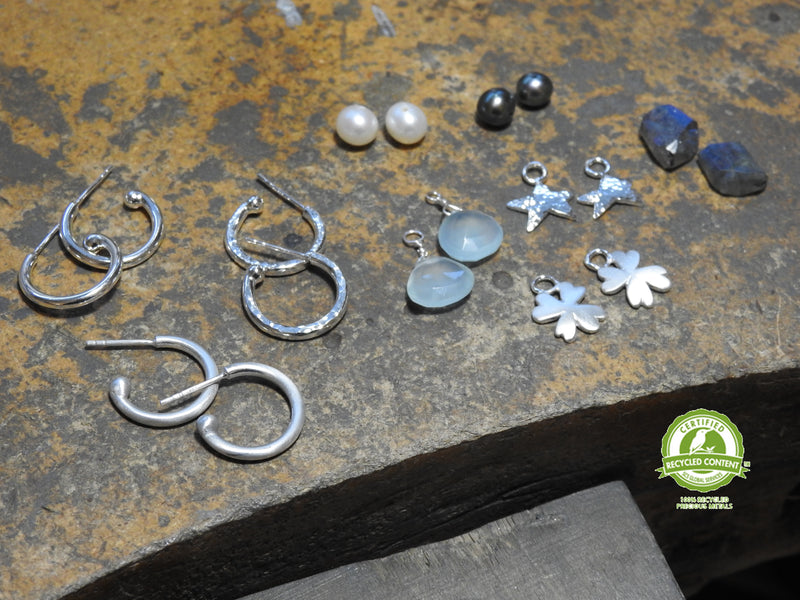 B E hoops with four leaf clover dangle