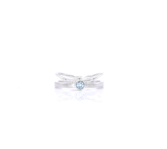 Ripple ring with sky blue topaz