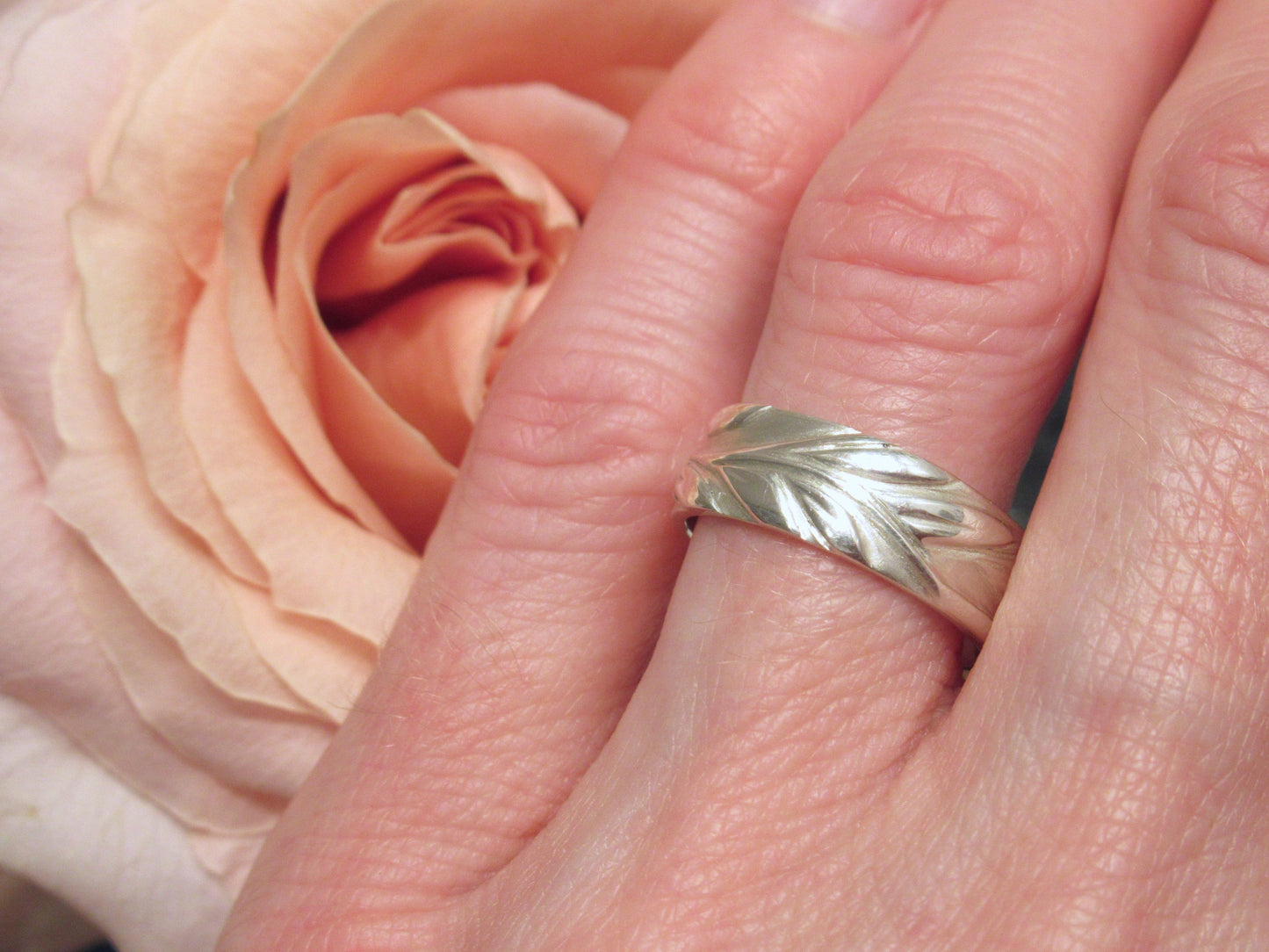 Eden ~  Handcarved leaf and vine ring. Carved in an organic manner where each visual side has a unique look.  The leaves and vine are high polished, with recessed areas matte, by ZEALmetal, Nicole Horlor, in Kingston, ON, Canada