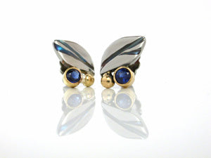 Steel and 18kt yellow sapphire stud's